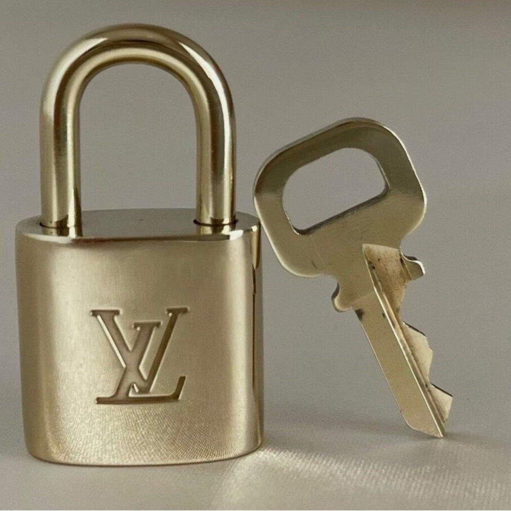 Louis Vuitton Luxurious Gold Padlock and Key Set